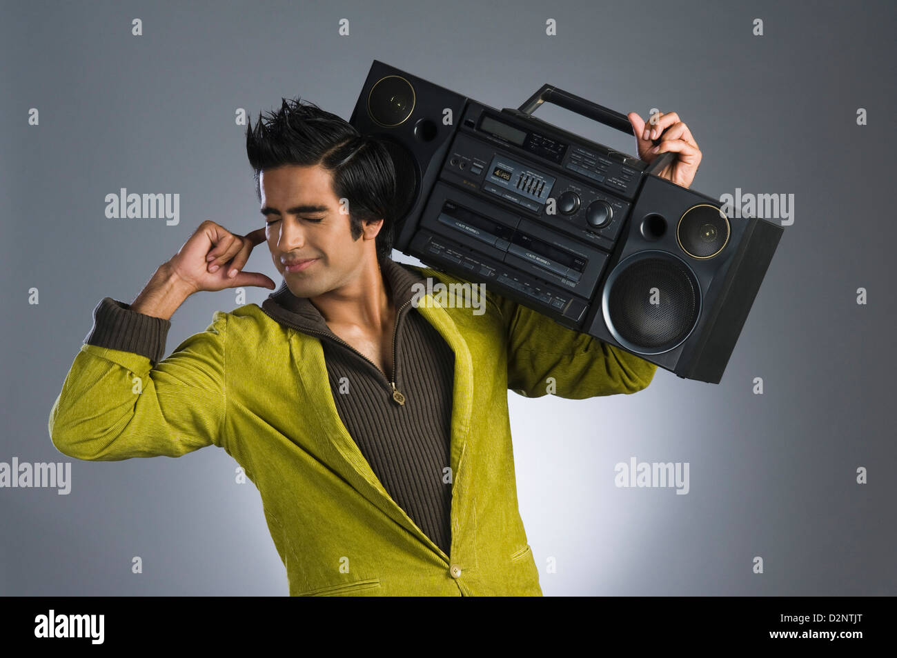 Man listening to a music system Stock Photo