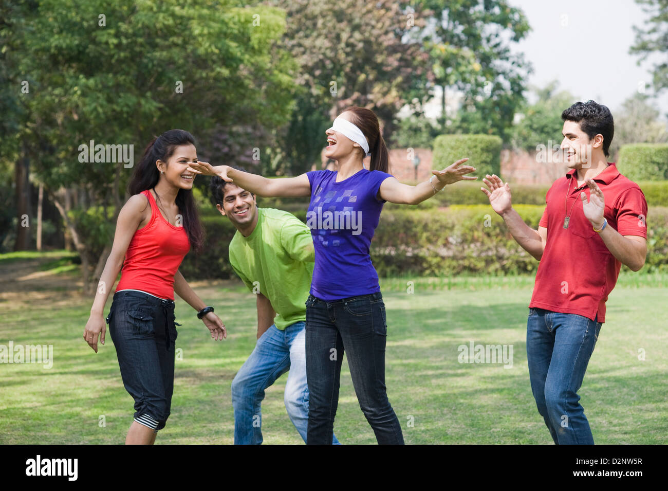 Friends playing blind man's bluff Stock Photo Alamy