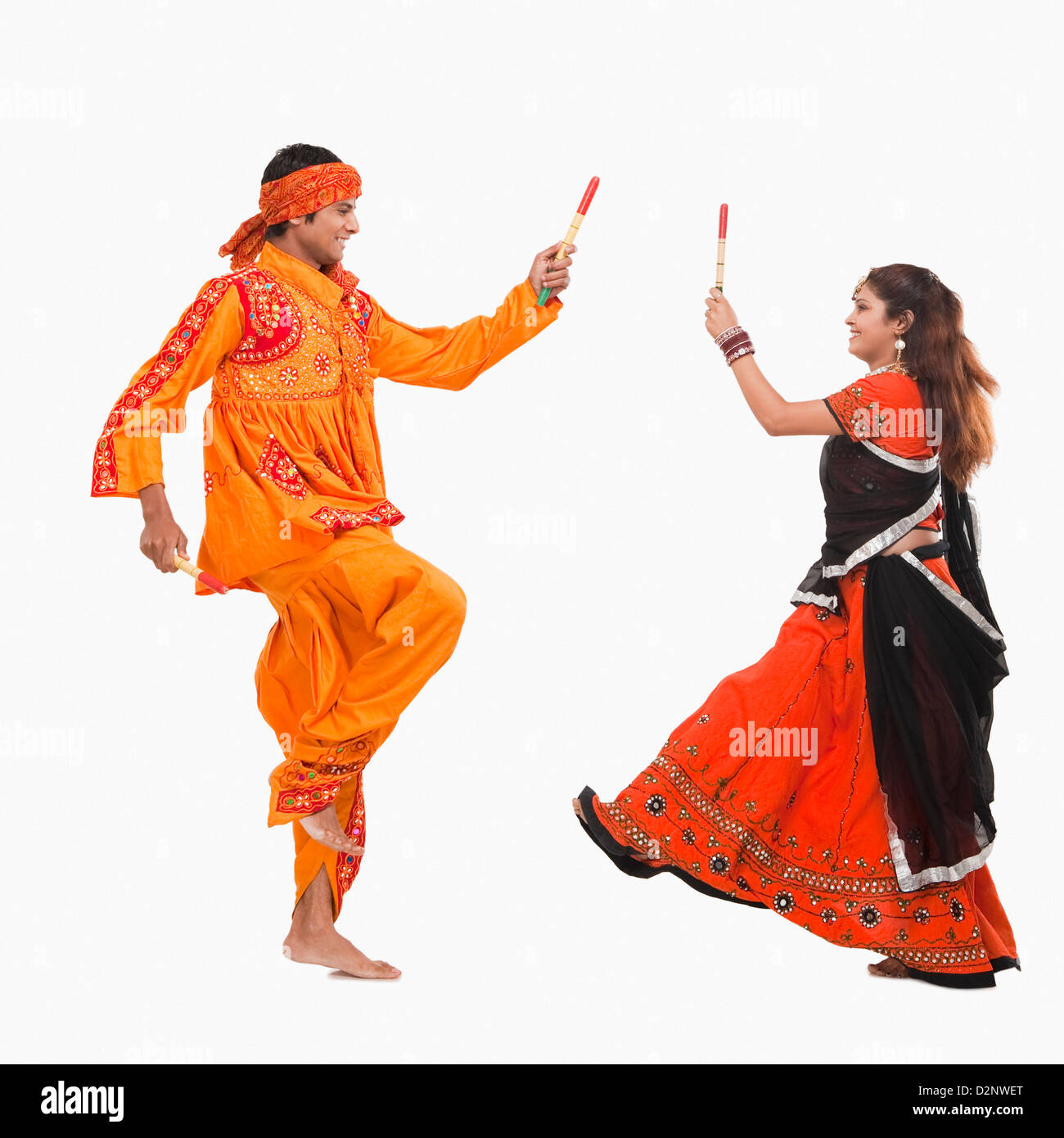Couple playing dandiya in disco garba night poster