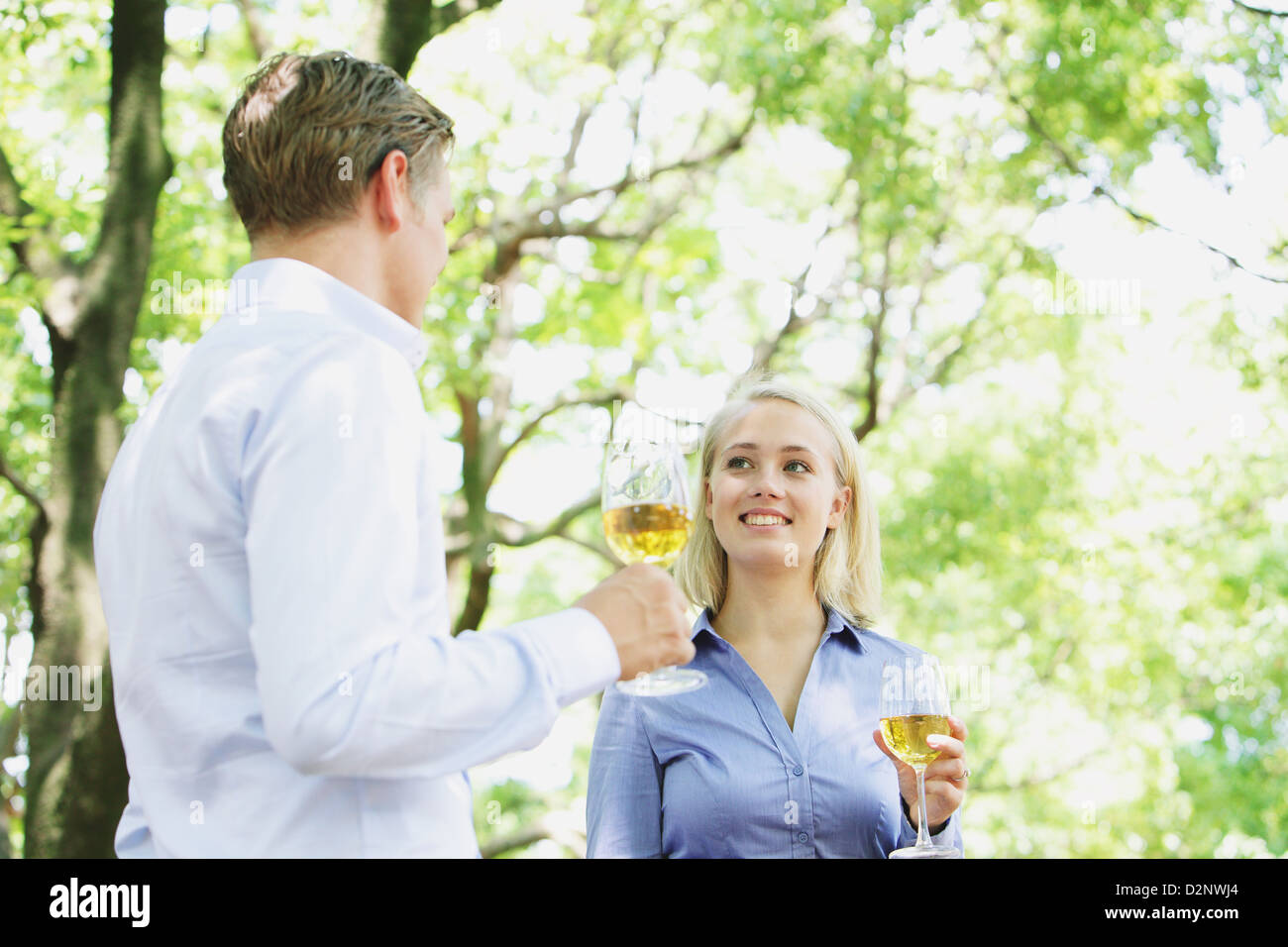 Young couple drinking wine Stock Photo - Alamy