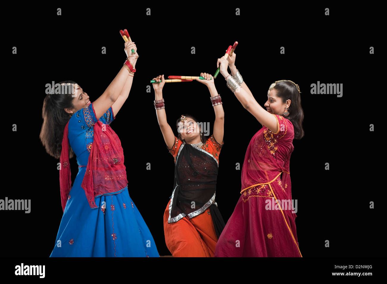 Women performing dandiya Stock Photo - Alamy