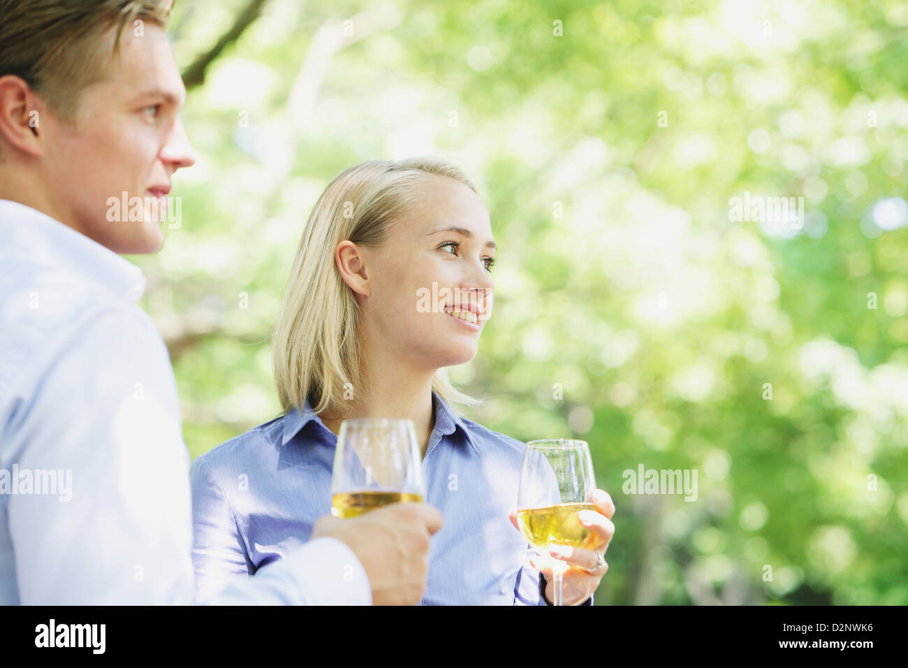 Young couple drinking wine Stock Photo - Alamy