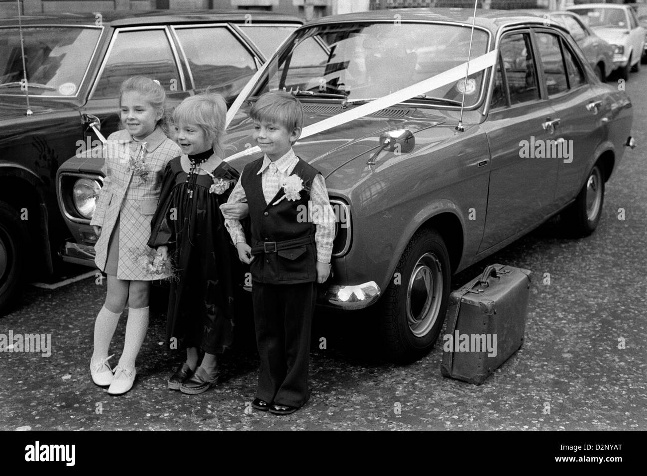 1970s UK 1972  Children at a wedding pretending to have just got married HOMER SYKES Stock Photo
