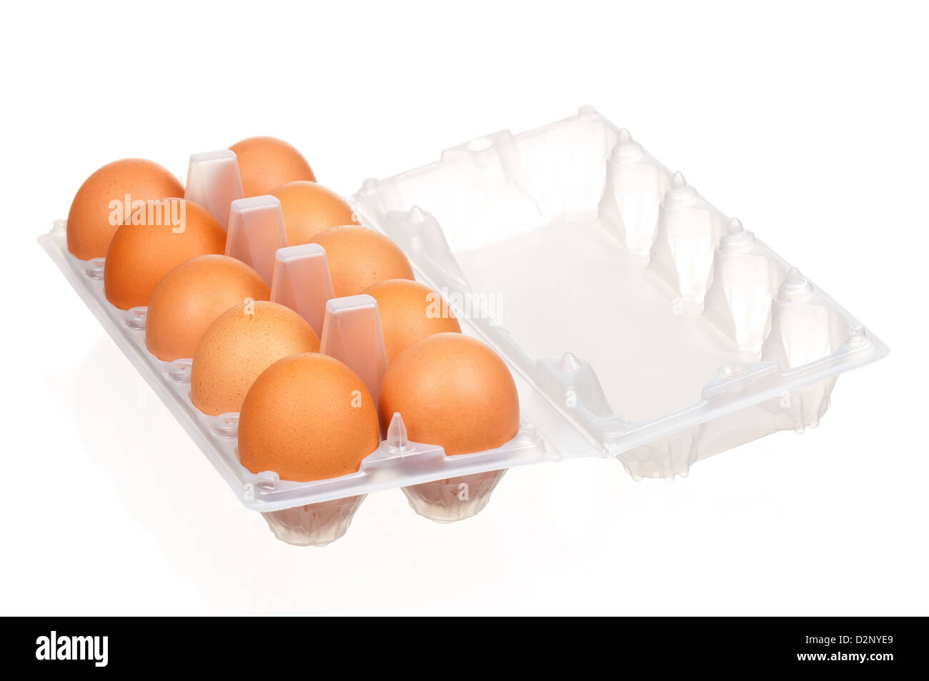 Brown eggs in the plastic box over white background Stock Photo