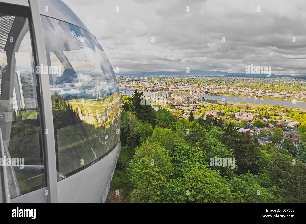 Portland aerial tram and view over the city districts in early summer. Stock Photo