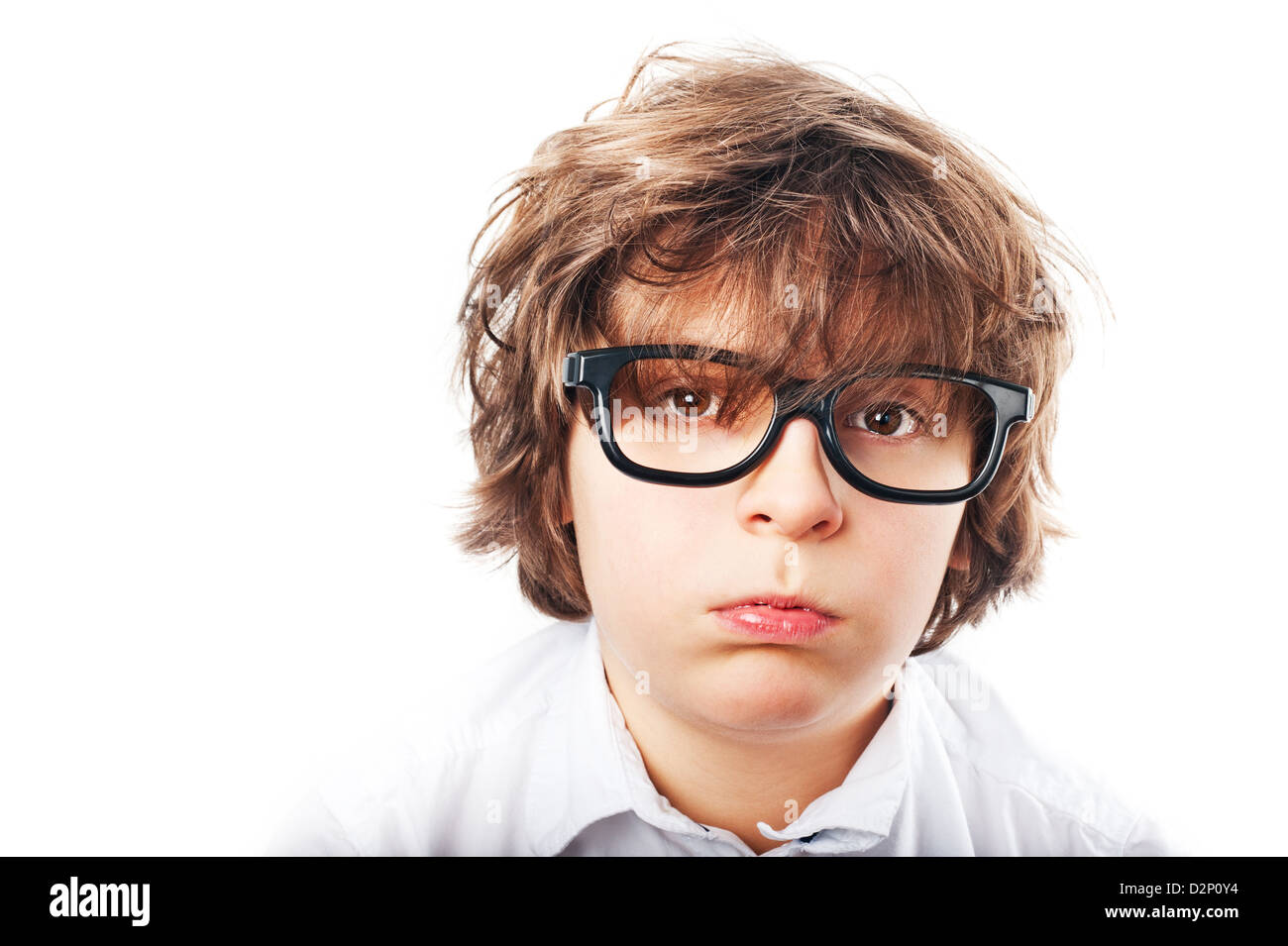 white boy with shaggy hair, a white shirt and fashion glasses, tired  looking at the camera Stock Photo - Alamy