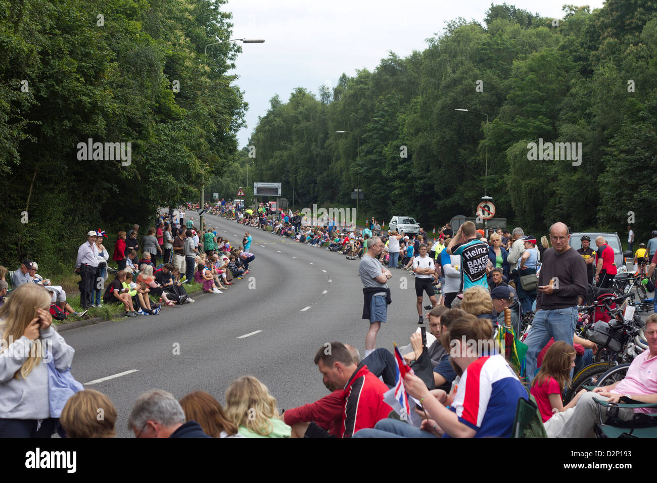 A crowd awaits competitors in the London 2012 Olympics Mens Cycling Time Trial. Stock Photo