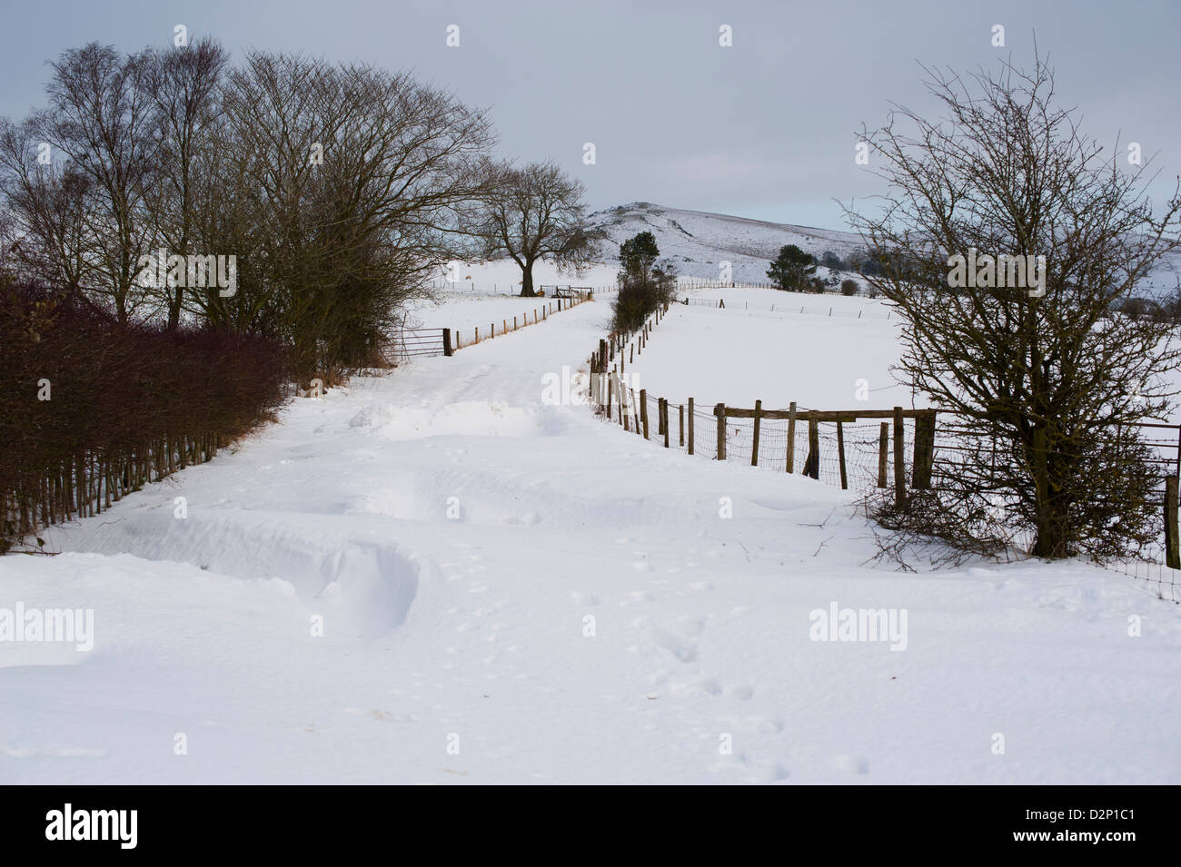 Snow covered country lane at Church Stretton in winter Shropshire England UK Stock Photo