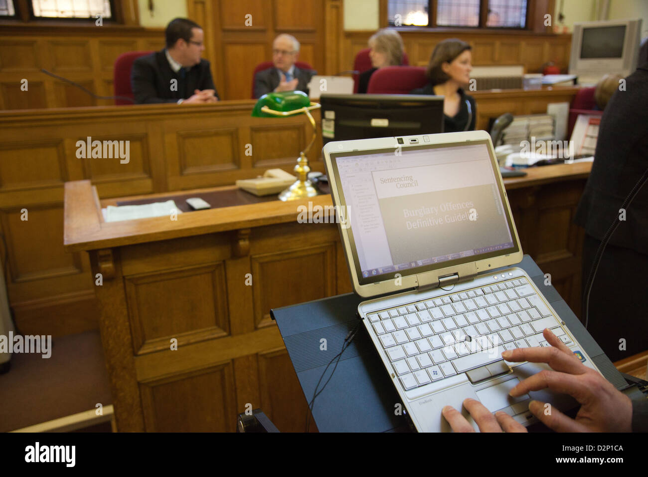 Photo which illustrates the use of technology inside court, in particular a tablet. Pictures is Maidstone Magistrates in Kent Stock Photo