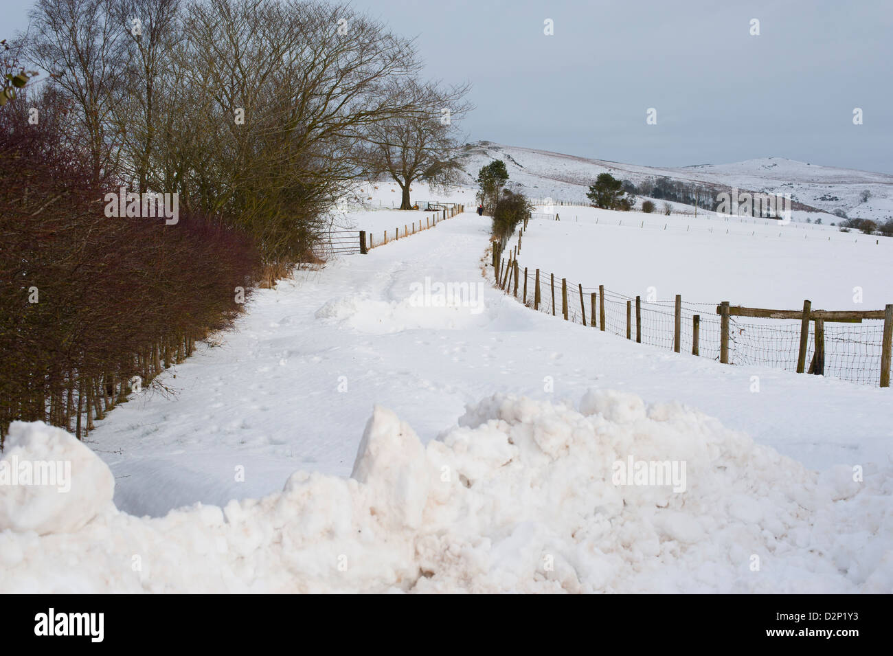 Snow covered country lane at Church Stretton in winter Shropshire England UK Stock Photo