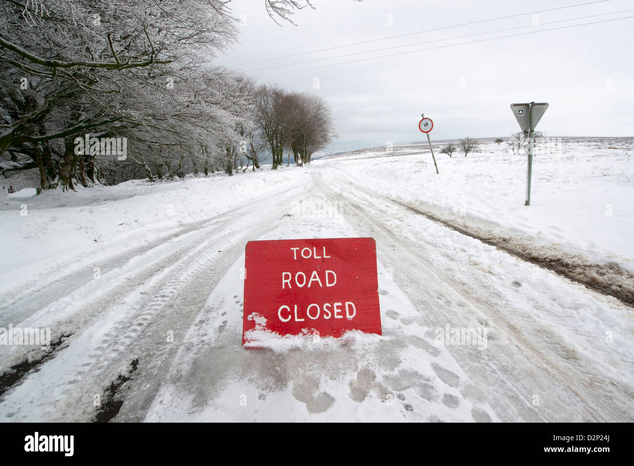 A toll road closed sign due to winter snow off the A39 near Porlock