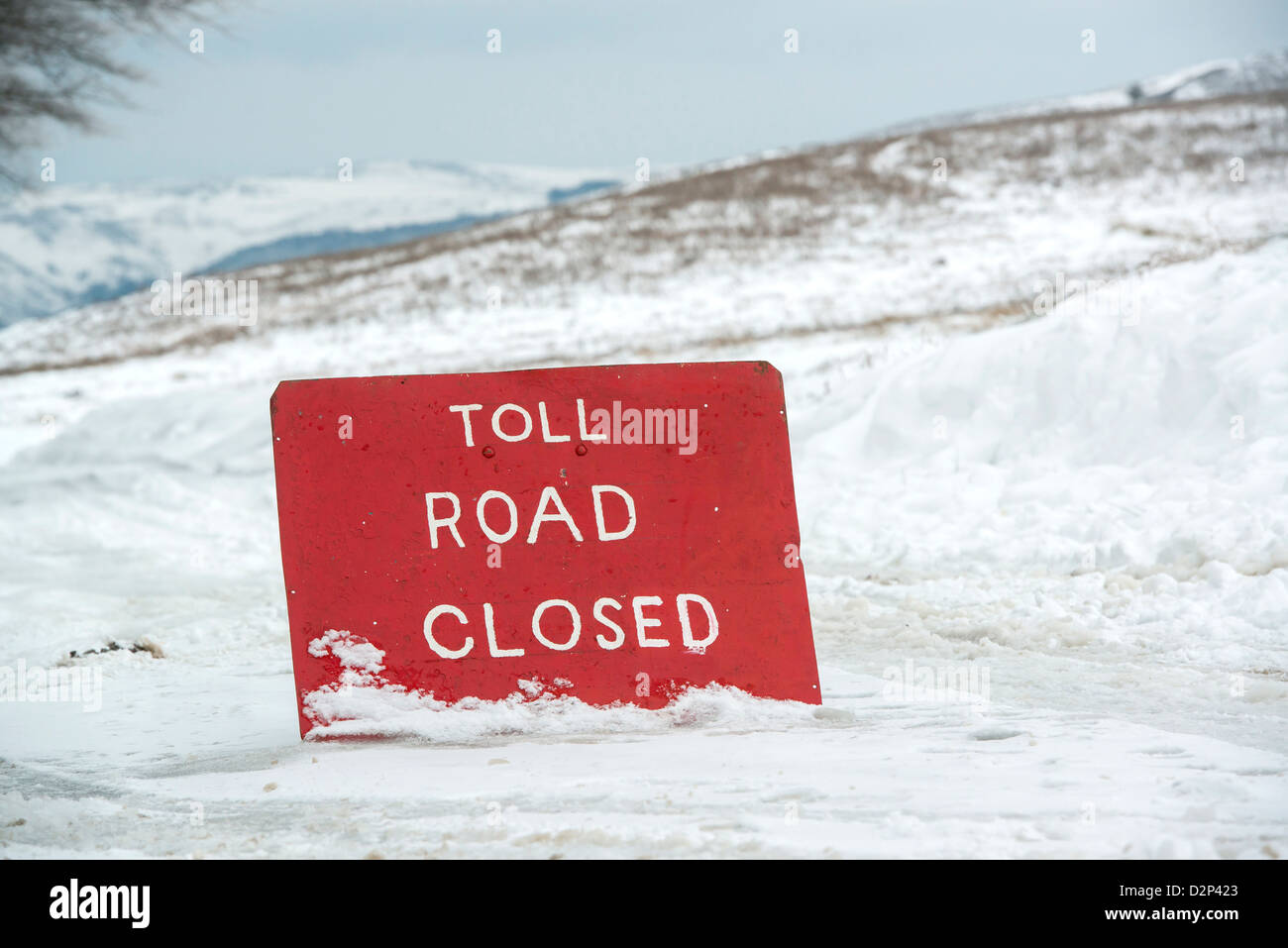 A toll road closed sign due to winter snow off the A39 near Porlock