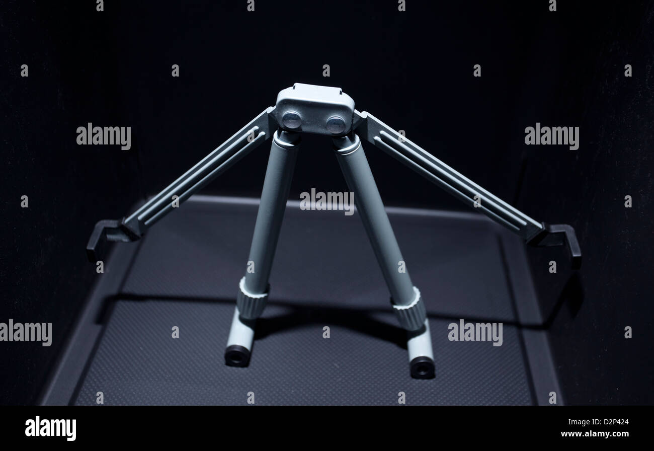 Laptop plastic stand looking like a robot. Stock Photo