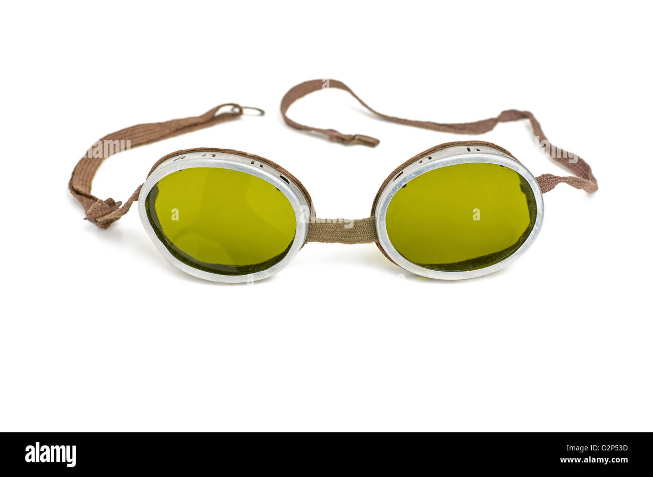old safety goggles with green tinted glasses Stock Photo