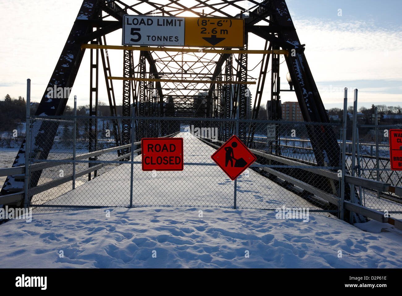 the closed old traffic bridge over the south saskatchewan river in winter downtown Saskatoon Saskatchewan Canada Stock Photo