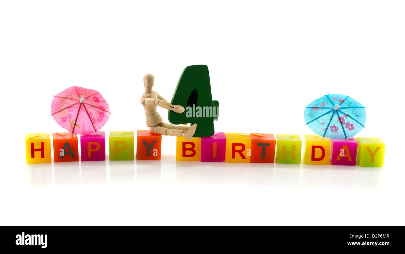 happy birthday candle letters with puppet and the number four Stock Photo