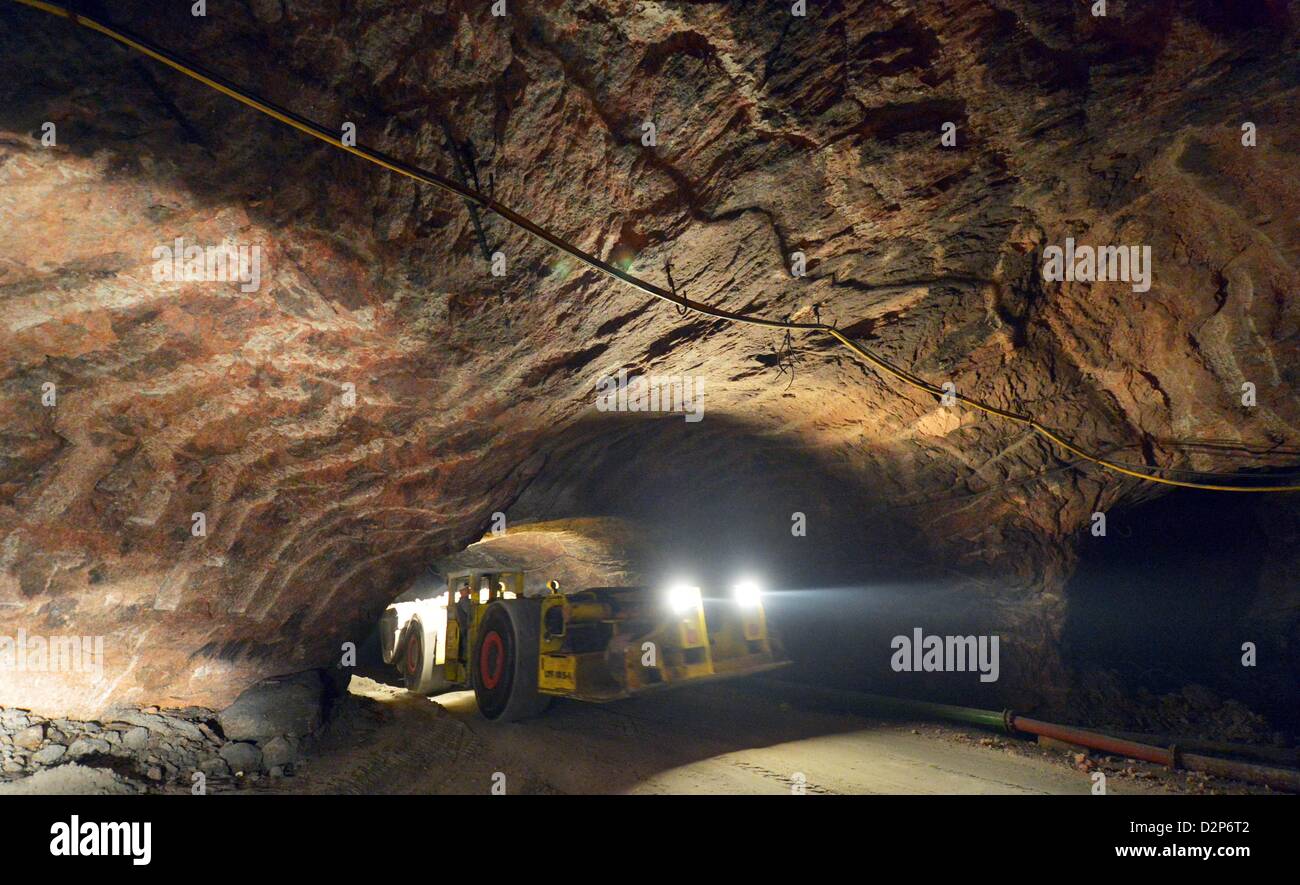 A mining truck drives  through the underground adits during the foundation ceremony of the new  'Deutschen Innovationszentrums unter Tage' (lit. German Innovation Centre underground) in the potash in Bleicherode, Germany, 30 January 2013. The facility envisions a testing area for industrial textiles and reserach facilities for materials that are applied to lightweight machines. Photo: Martin Schutt Stock Photo