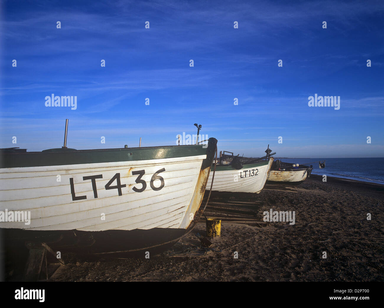 Fishing-smacks drawn up on the beach at Dunwich, Suffolk, England Stock Photo
