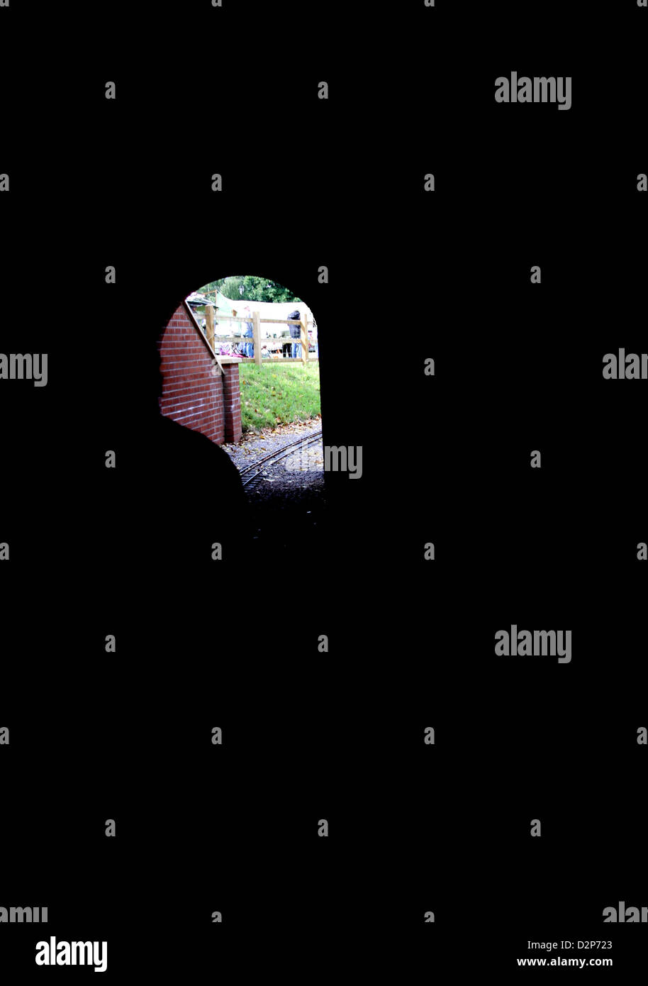 Inside a tunnel on a miniature railway Stock Photo