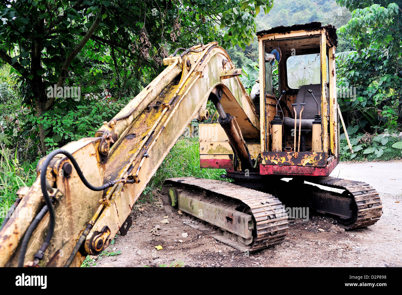 Broken old dozer in the nature Stock Photo - Alamy