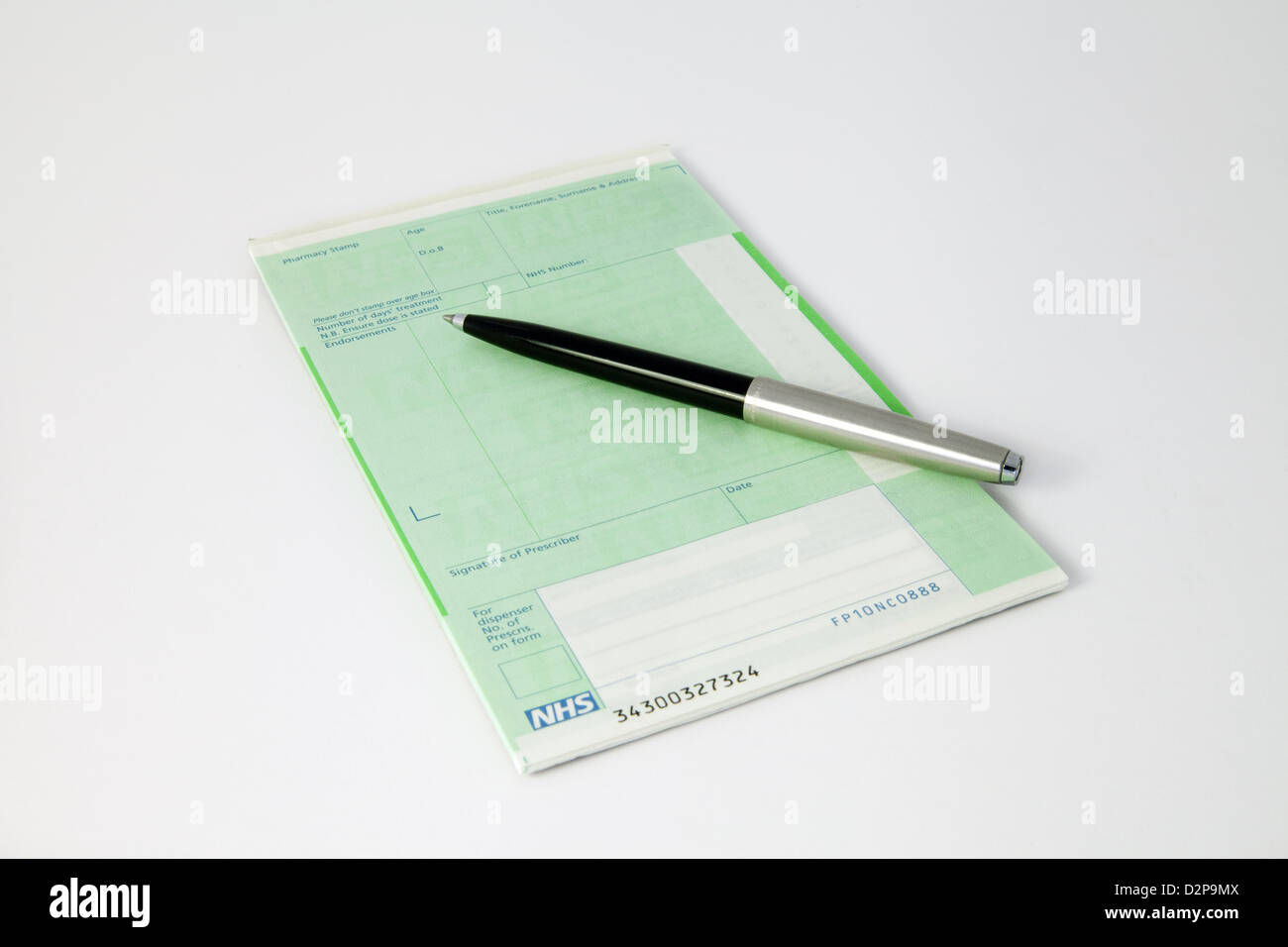 A british NHS prescription pad and pen, England UK Stock Photo