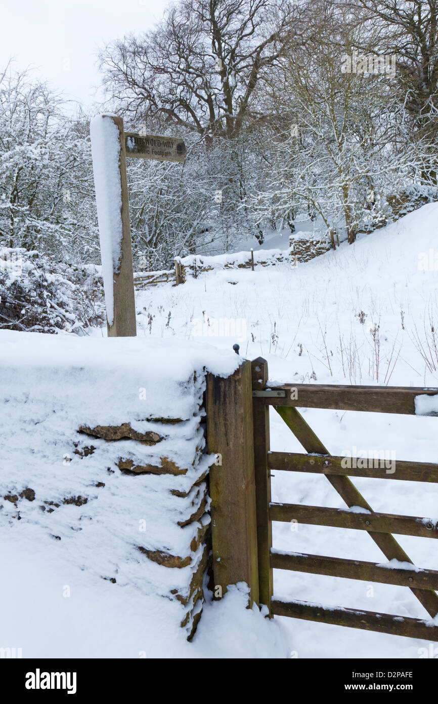 Snow on the Cotswold Way in winter at Stumps Cross, near Stanway, Gloucestershire, UK Stock Photo