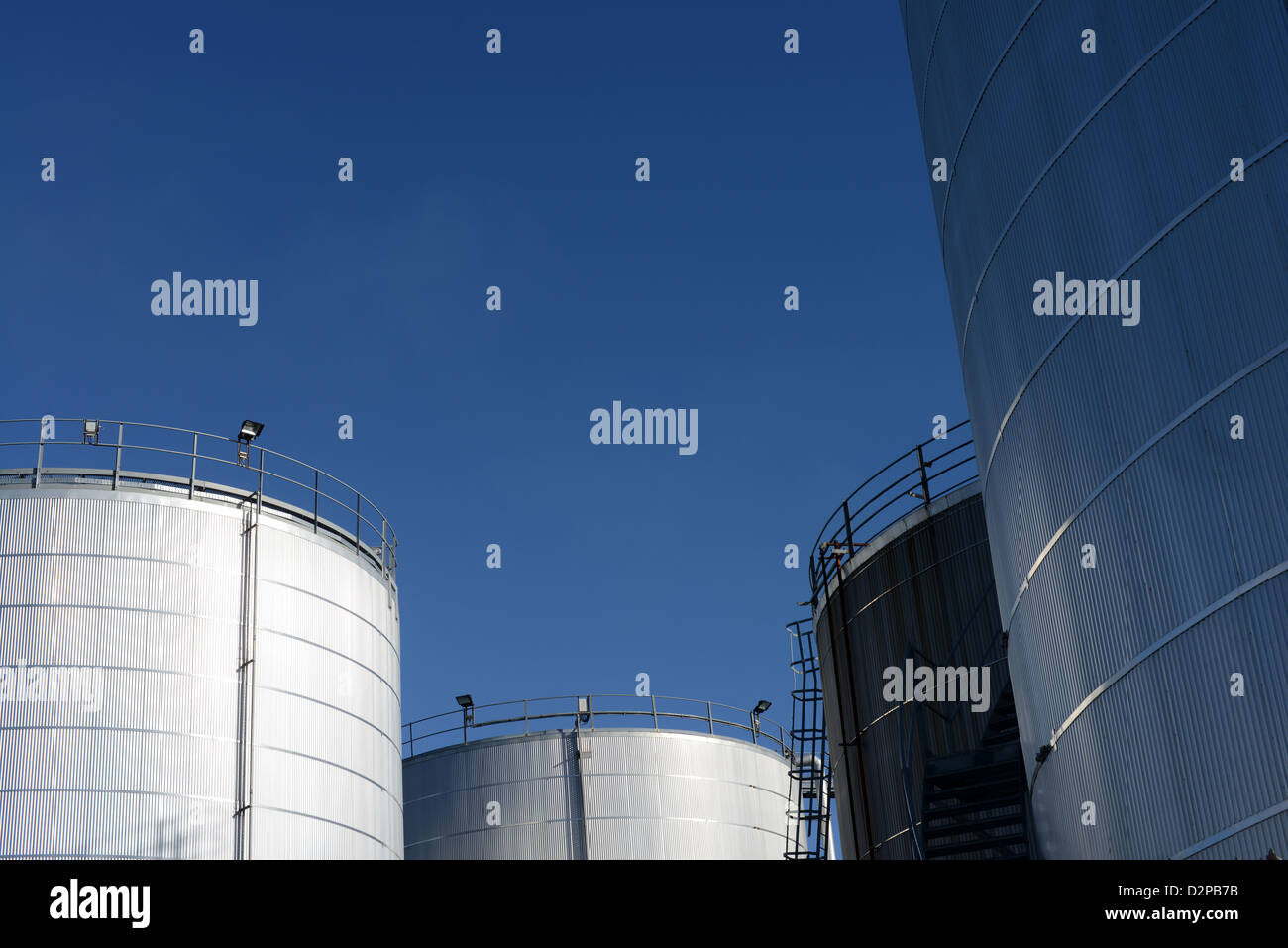 storage tanks at an industrial production plant and processing facility Stock Photo