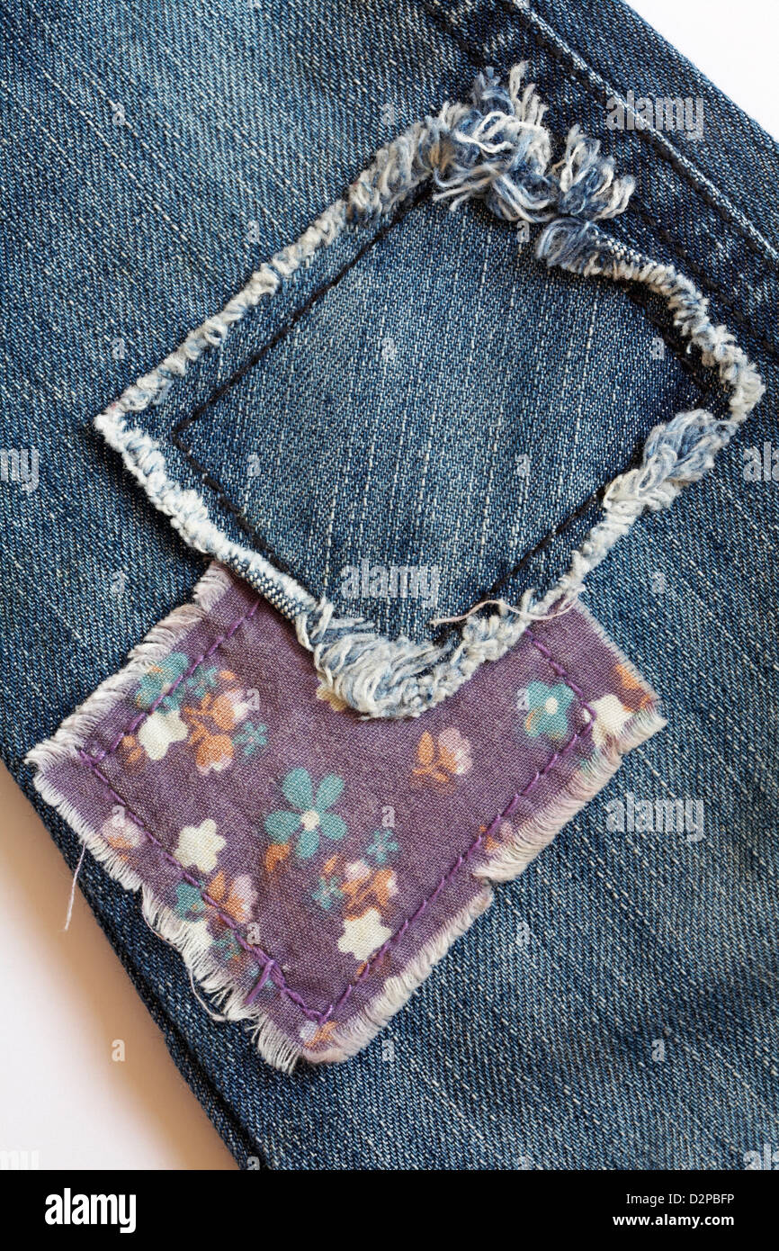 patches on toddler's denim jeans Stock Photo - Alamy