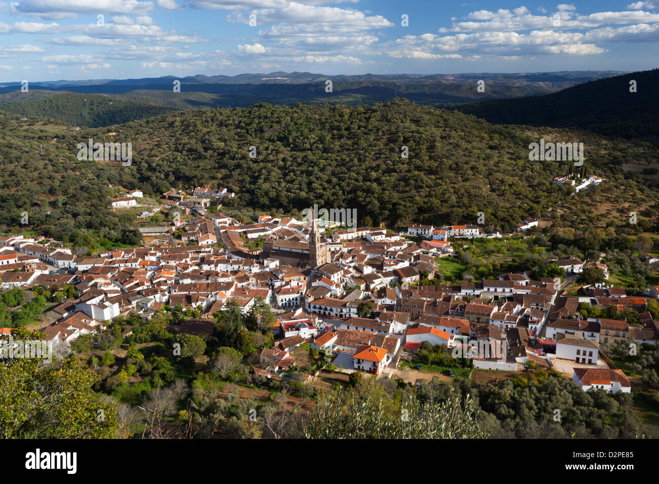 View over village and Sierra de Aracena from the Pena de Arias Montano Stock Photo