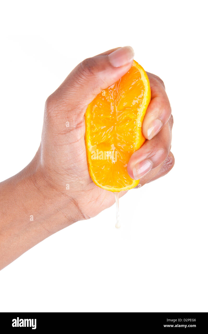 Hand squeezing orange hires stock photography and images Alamy