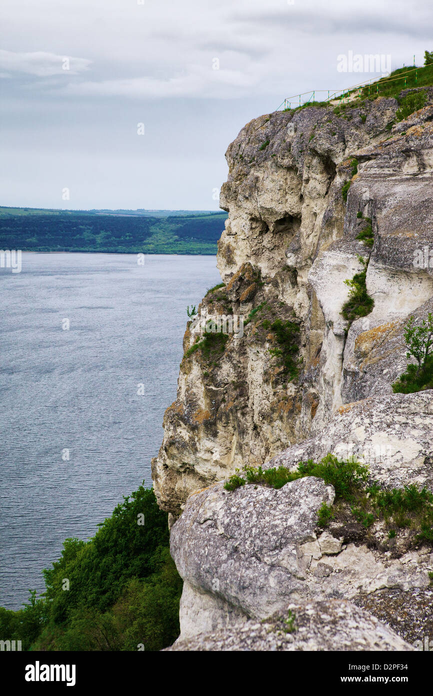 high rock over river at cloudy day, Dniester, Ukraine Stock Photo