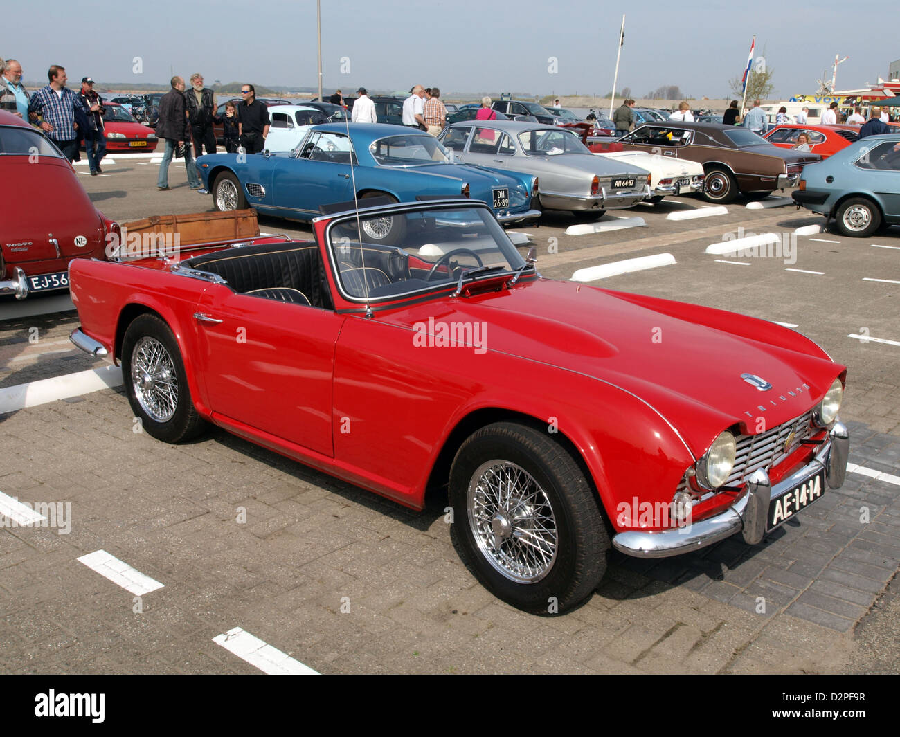 The 1965 Triumph TR4 is a classic British roadster known for its stylish design and sporty performance. It remains a sought-after collectible among car enthusiasts and collectors of vintage automobiles. Stock Photo