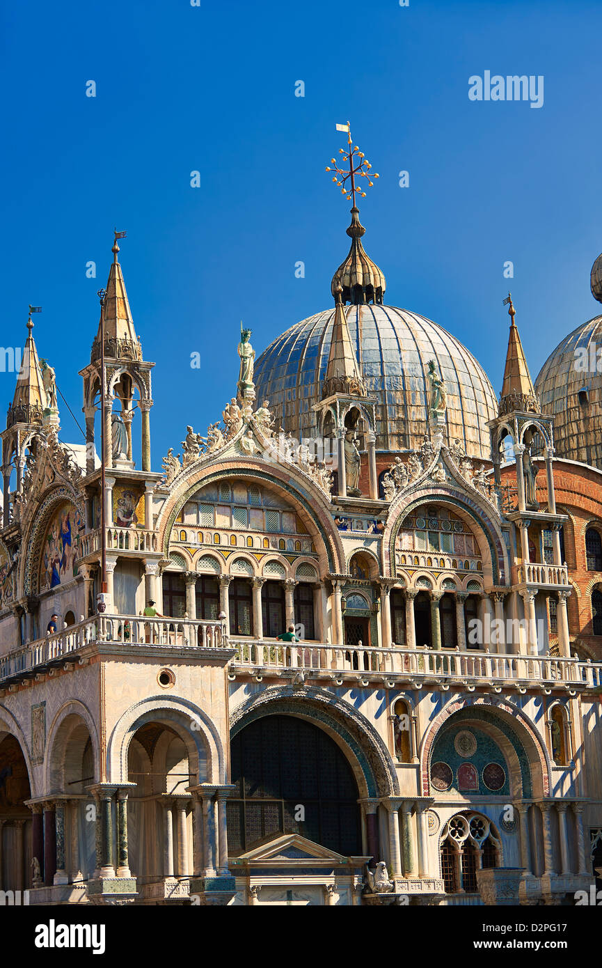 Facade with Gothic architecture and Romanesque domes of St Mark's Basilica, Venice Stock Photo