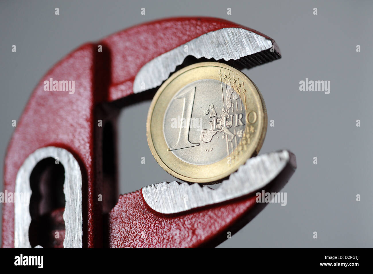 Berlin, Germany, a euro in the forceps Stock Photo