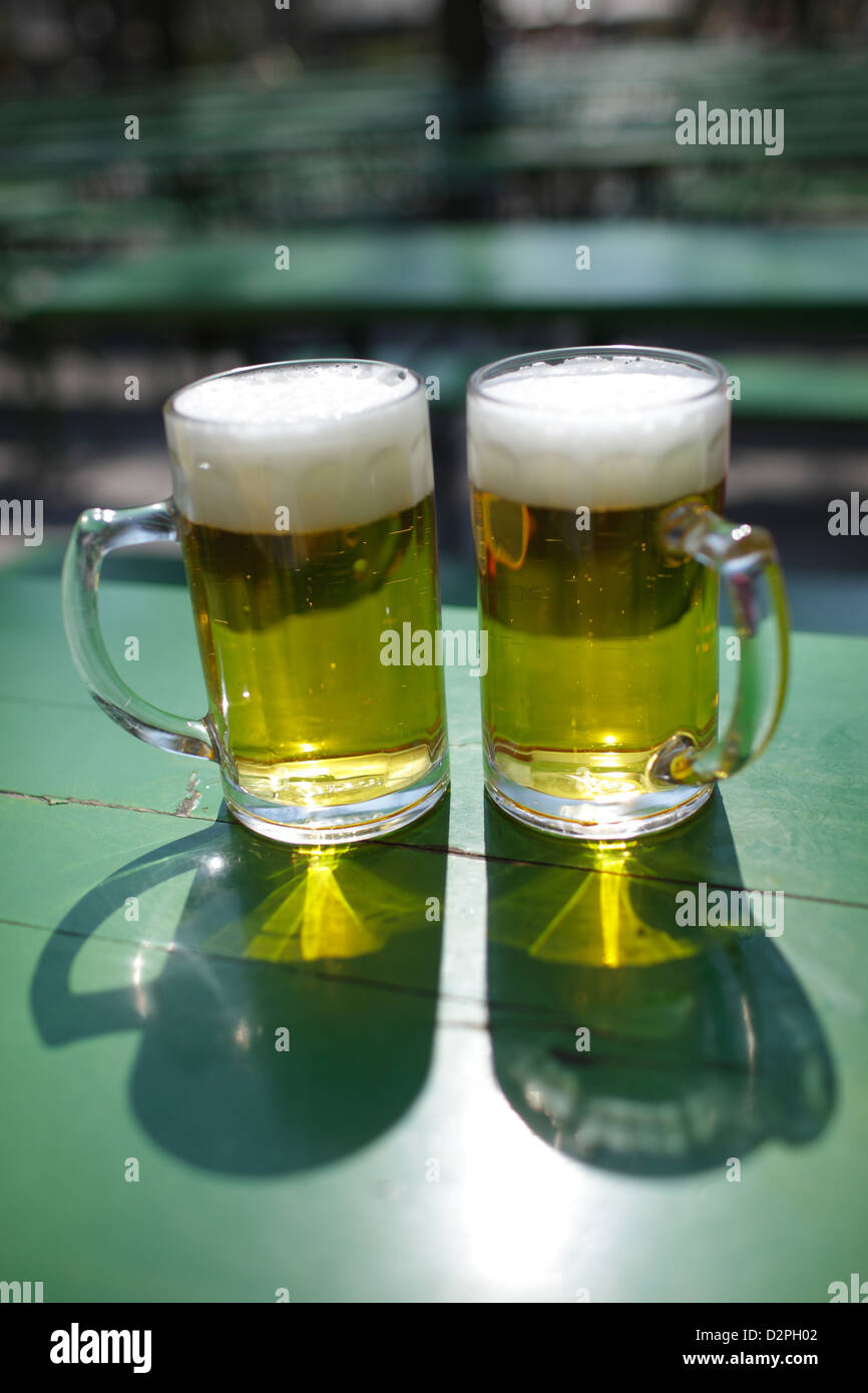 Munich, Germany, two glasses of beer in the beer garden Stock Photo Alamy