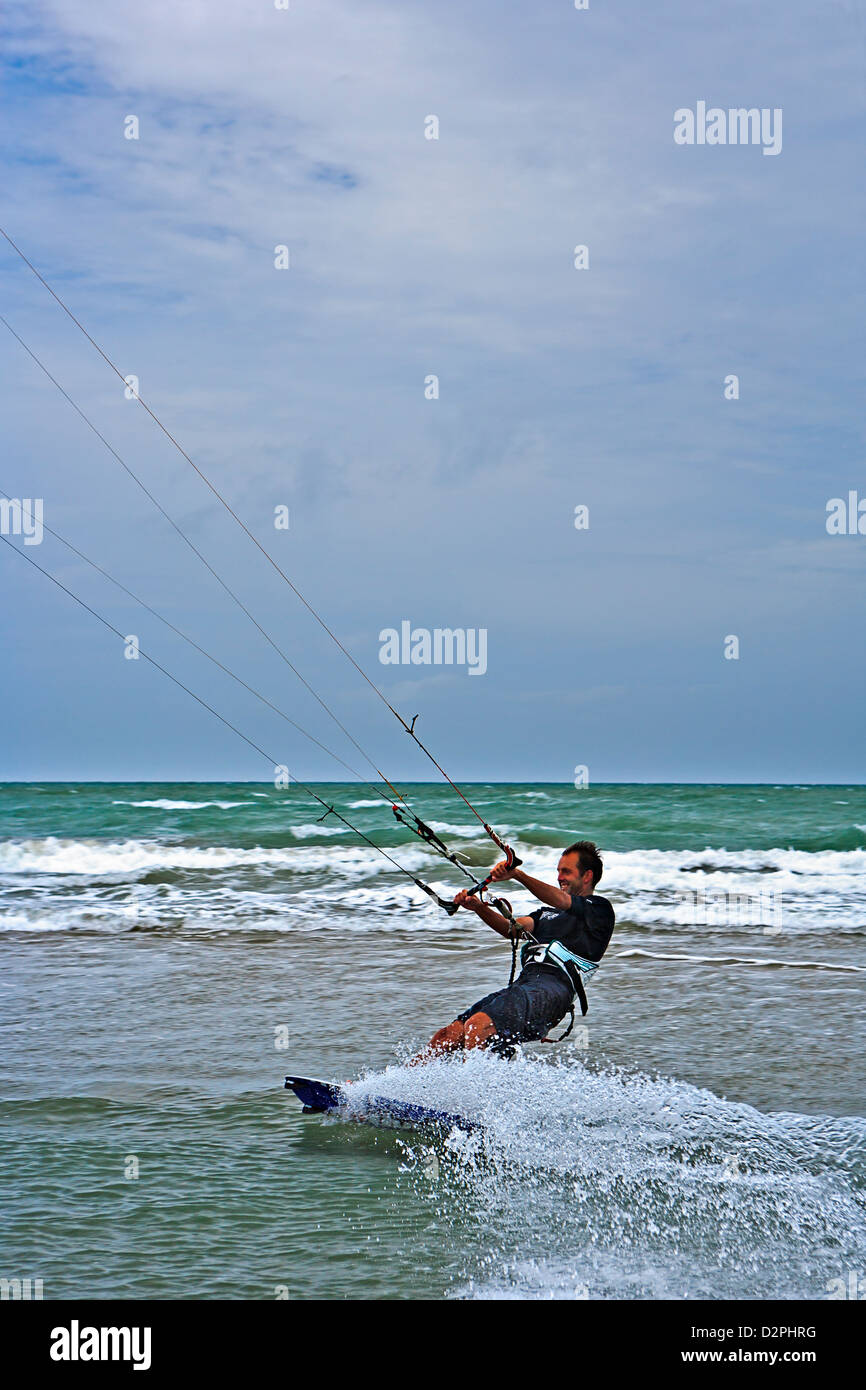 Kitesurfing along the beach in Orewa, north of Auckland, North Island