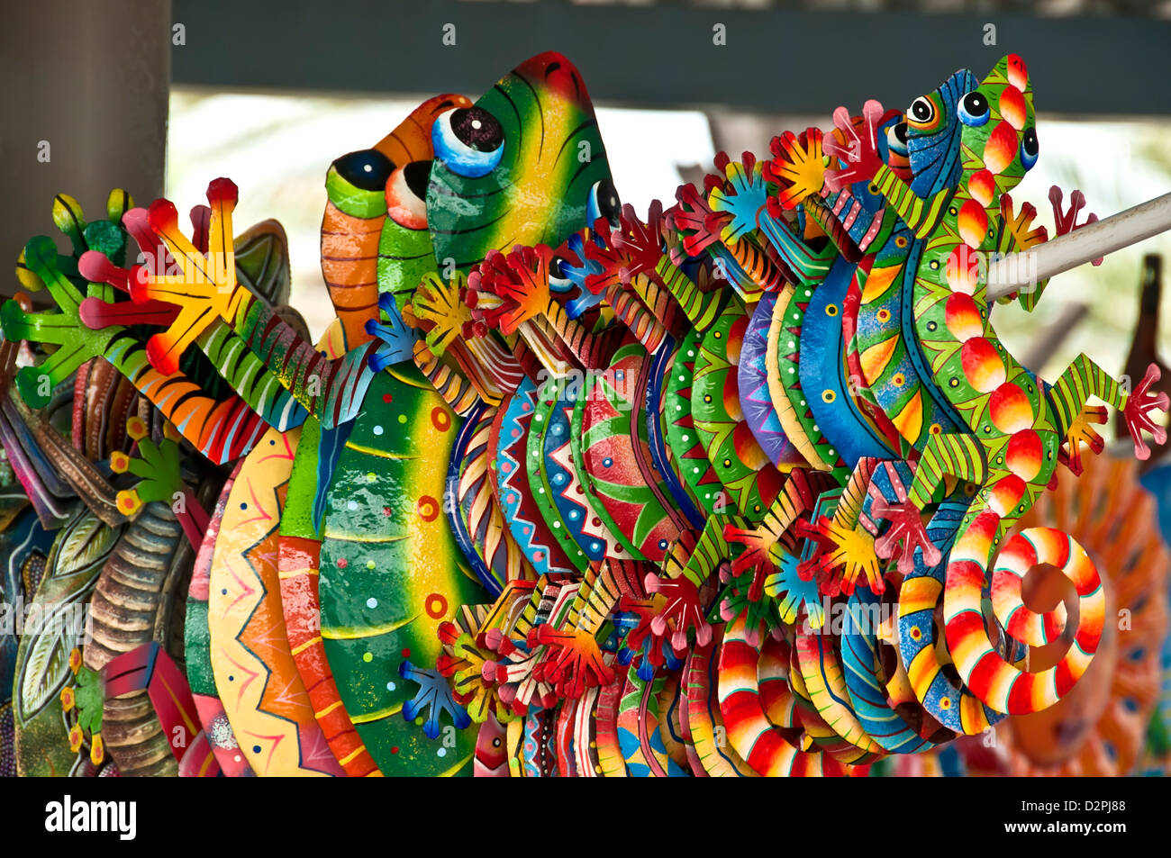 Colorful toy iguana souvenirs shopping, Willemstad, Curacao Stock Photo