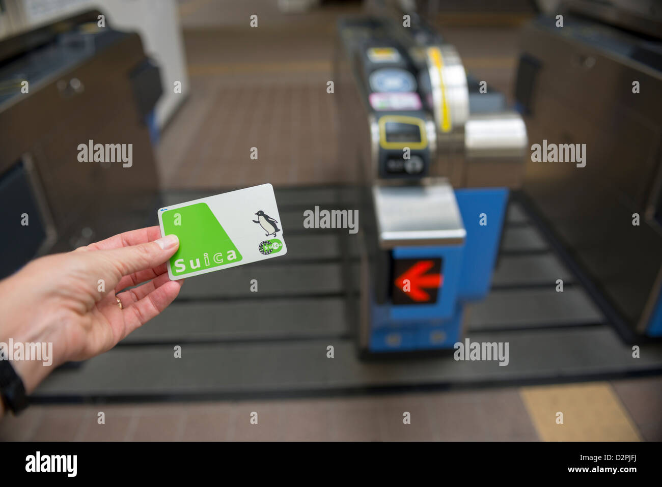 Stored value card Suica in front of a train entrance gate in Tokyo Japan Stock Photo