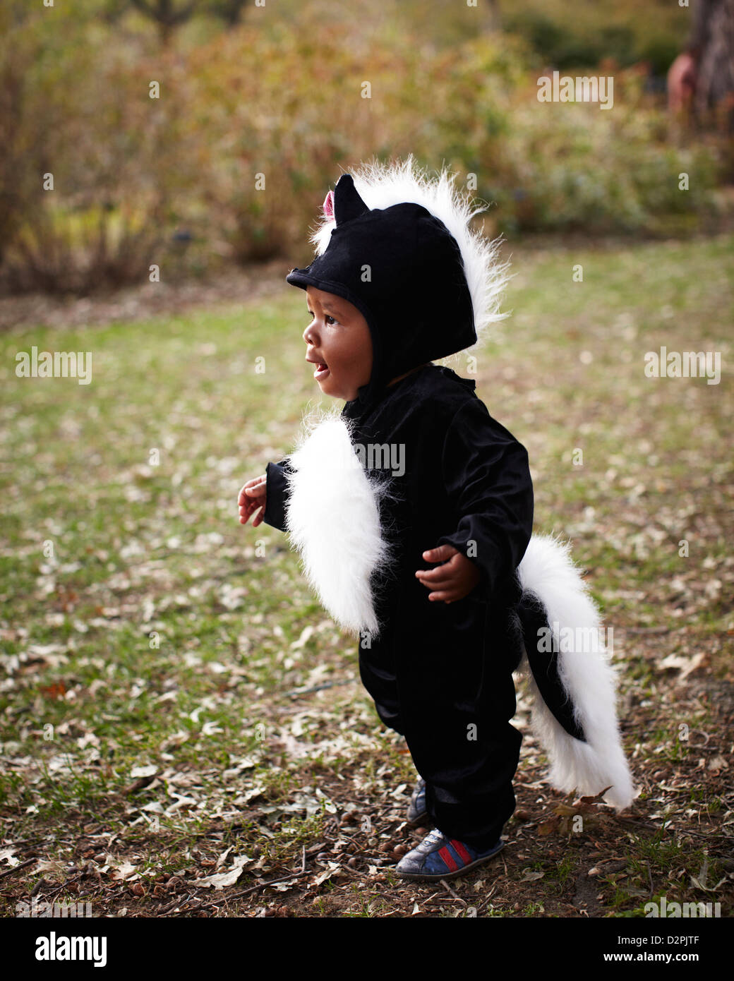 African American baby in skunk costume Stock Photo