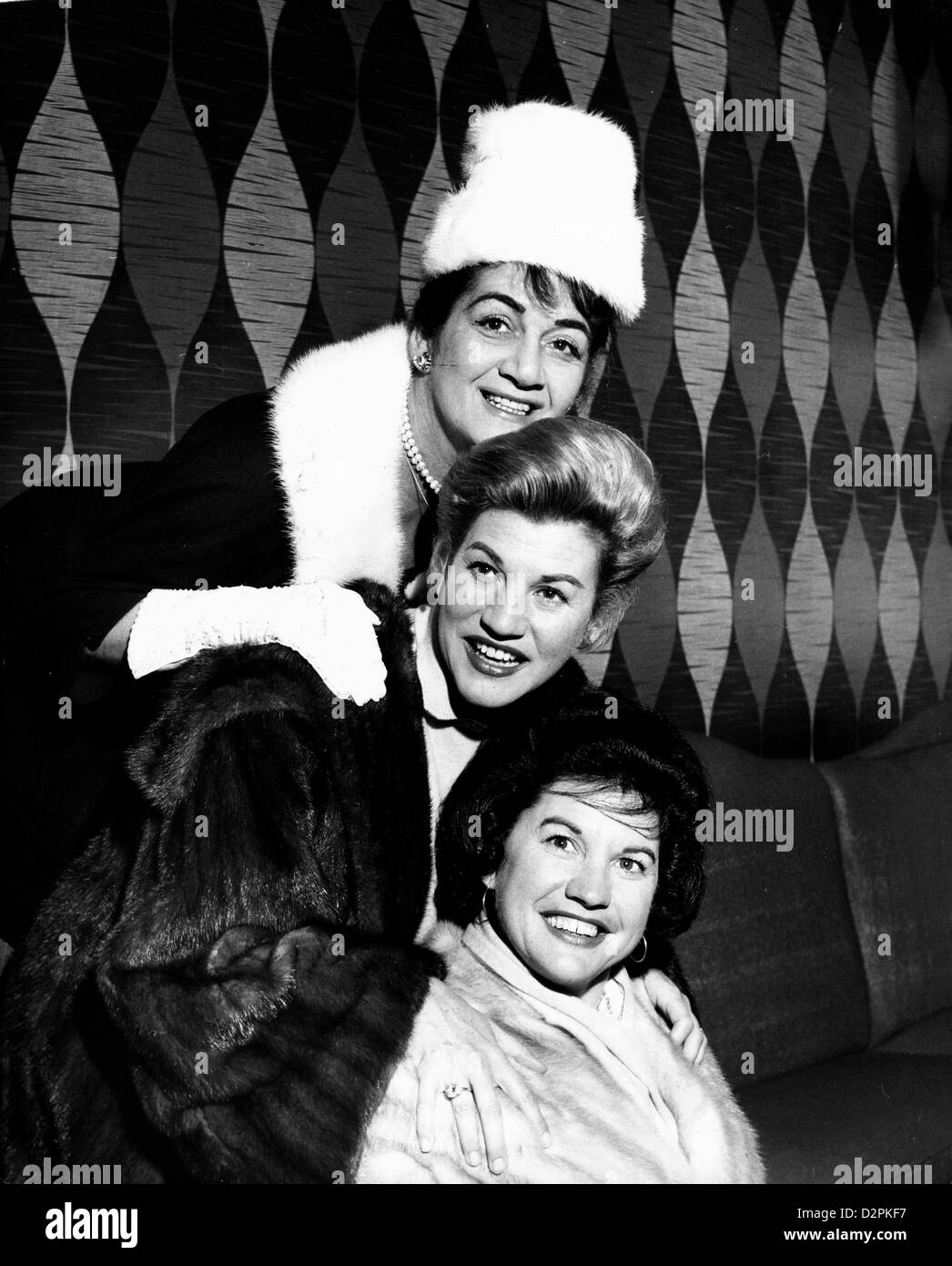 Jan. 30 , 2013 - Patty Andrews, the last surviving member of the singing Andrews Sisters, who sang hits such as 'Boogie Woogie Bugle Boy of Company B' and 'I Can Dream, Can't I?' died at 94  at her home in Northridge. PICTURED: Dec. 1, 1960 - London, England, United Kingdom - The famous singing trio 'THE ANDREW SISTERS' have arrived in London for a season at London's 'Tallk of the Town.' This is their first visit to Britain for nine years. They have starred in 17 big films and have made record sales of more than 60,000,000. PICTURED: Andrew Sisters; (from top to bottom) LAVERNE, PATTY and MAXE Stock Photo