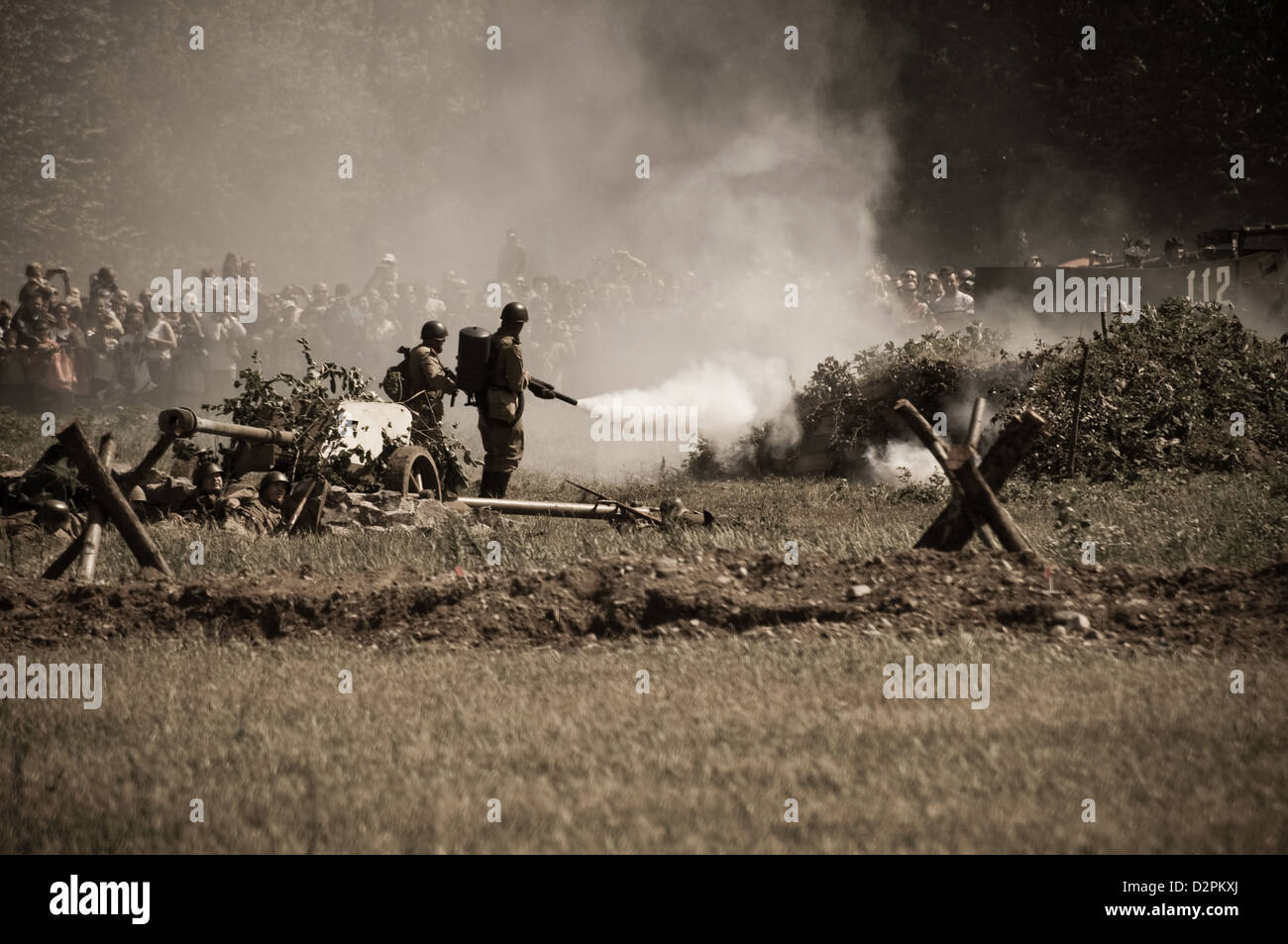 Soviet soldiers attacking enemy - reenactment of World War II fights near river Hron on July 7, 2009 in Tekov, Slovakia Stock Photo