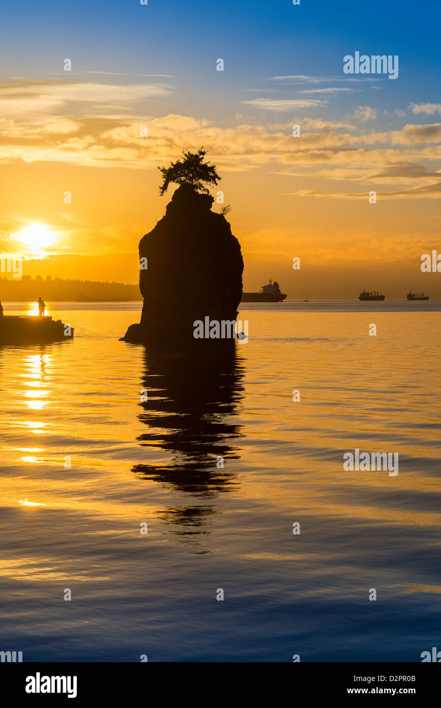 Siwash Rock, and Stanley Park at sunset, Vancouver, British Columbia, Canada Stock Photo