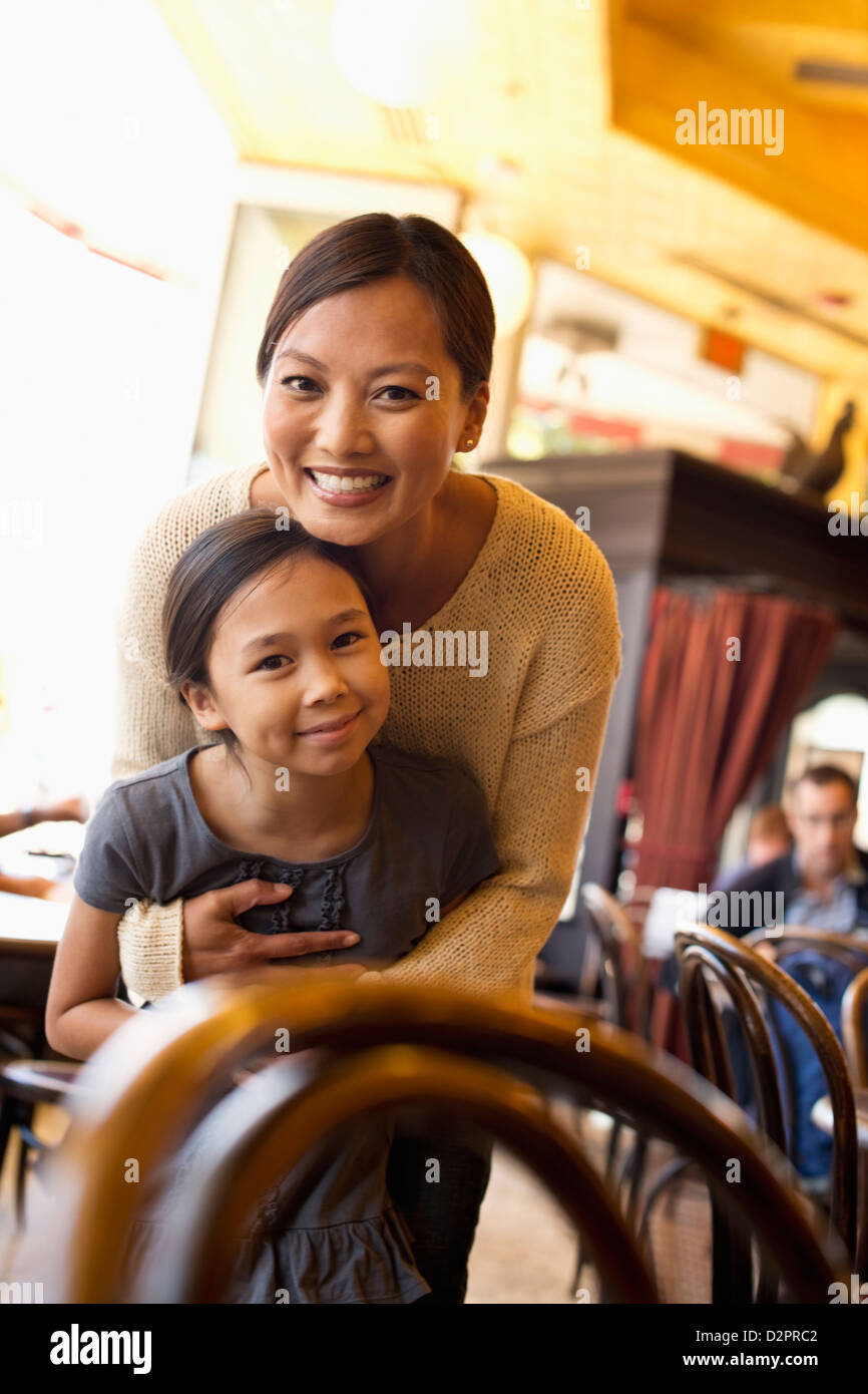 Filipino mother and daughter in cafe Stock Photo