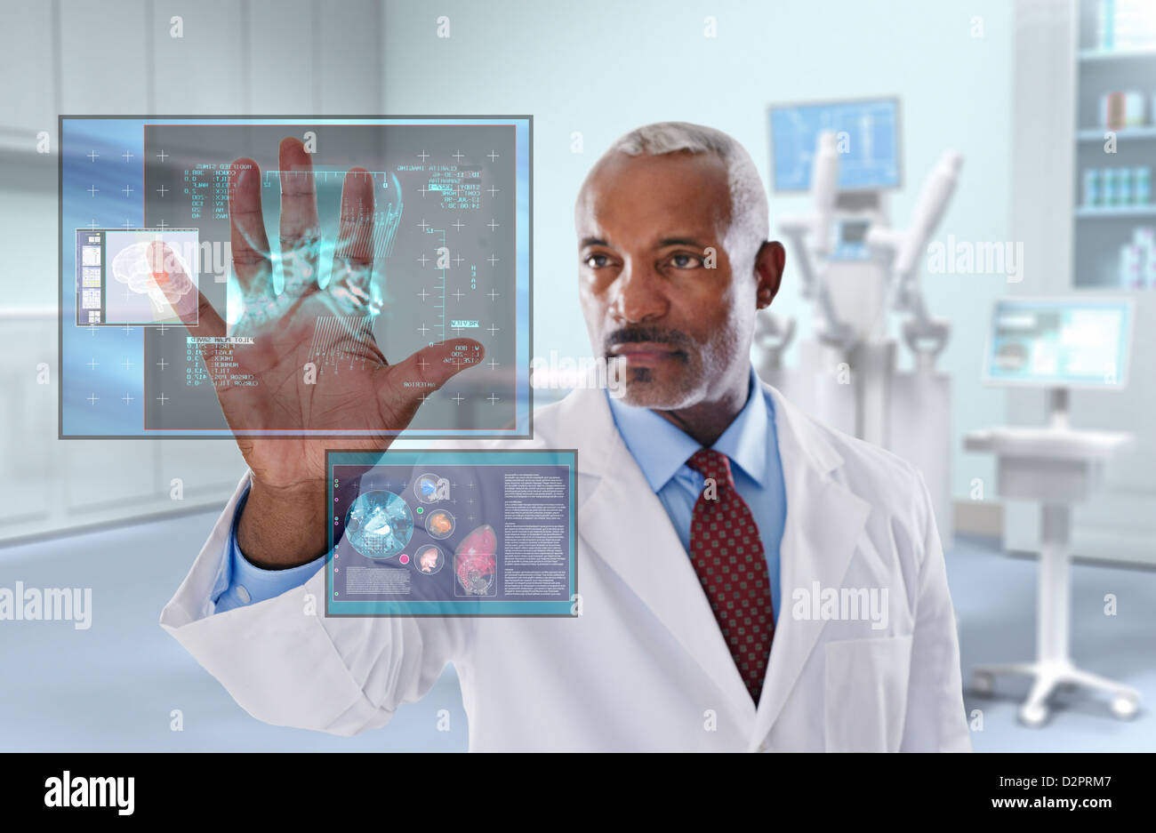 Black doctor looking at digital display in doctor's office Stock Photo