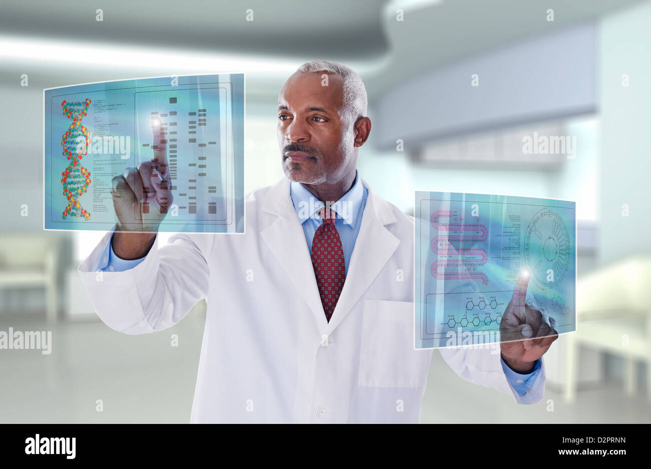 Black doctor using digital display in doctor's office Stock Photo
