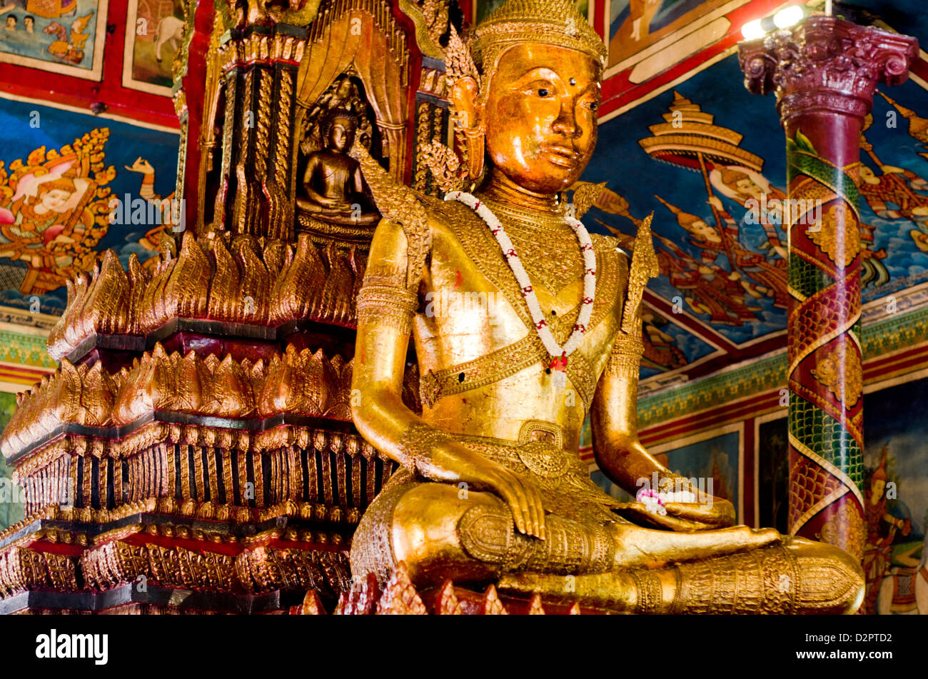 Bronze statue of Buddha at Wat Phnom shrine,Phnom Penh,Cambodia Stock Photo