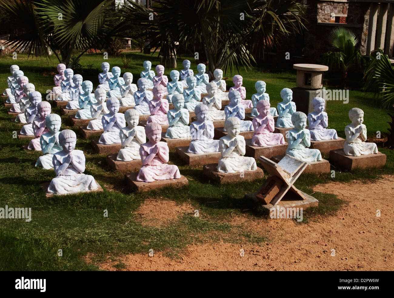 Statues of students studying, Garden of Five Senses, Saidul Ajaib, New Delhi, India Stock Photo