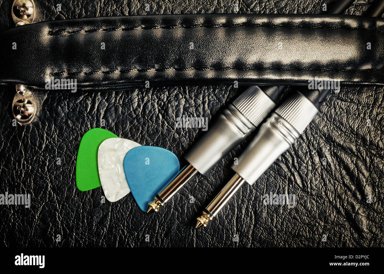guitar amplifier with cable jack and plectrums, closeup Stock Photo Alamy