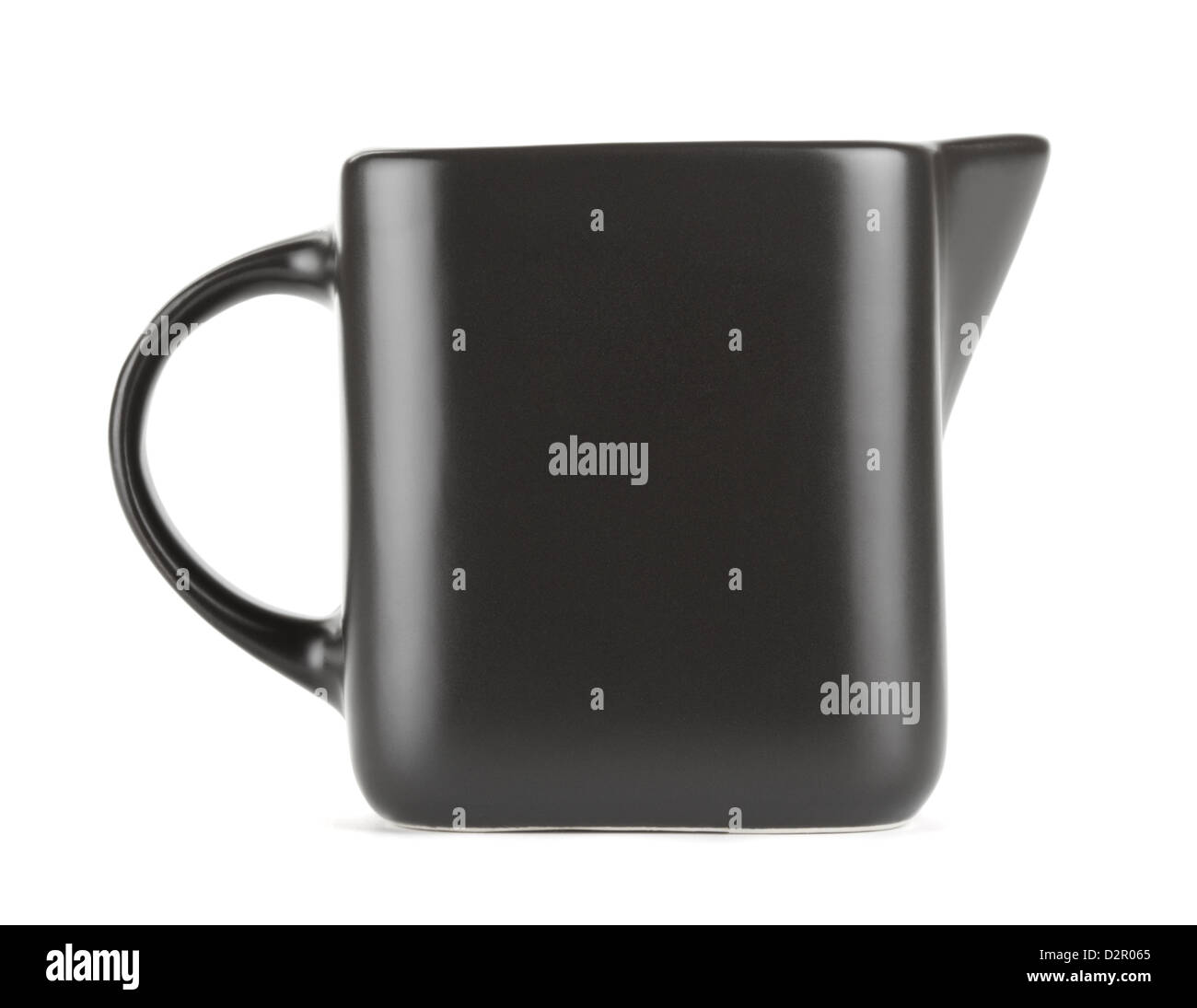 empty quadratic pitcher jug for milk isolated on white Stock Photo Alamy