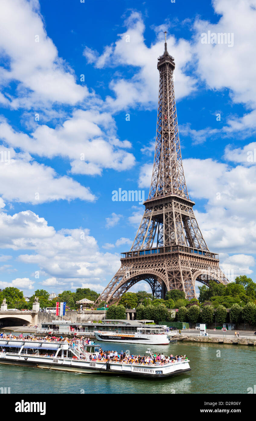 Bateaux Mouches tour boat on River Seine passing the Eiffel Tower, Paris, France, Europe Stock Photo